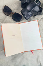 THE OPEN SUITCASE